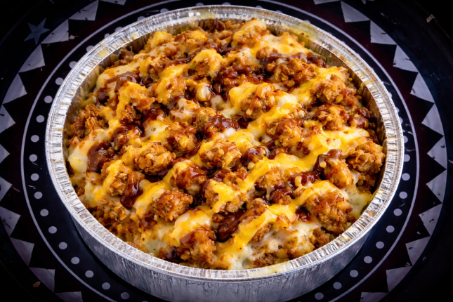 Nachos cheddar 7,50€ - Restaurante en The best food - RESIDENCIAL EL QUIÑON