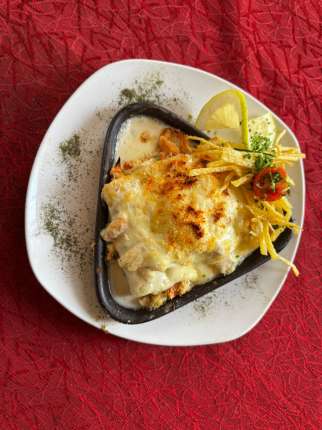 Canelones Rellenos con Carne de Jaiba - Restaurante en Secretos a Bordo - Recoleta, Santiago