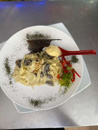 Fettuccini Salsa de Champiñones - Restaurante en Secretos a Bordo - Recoleta, Santiago